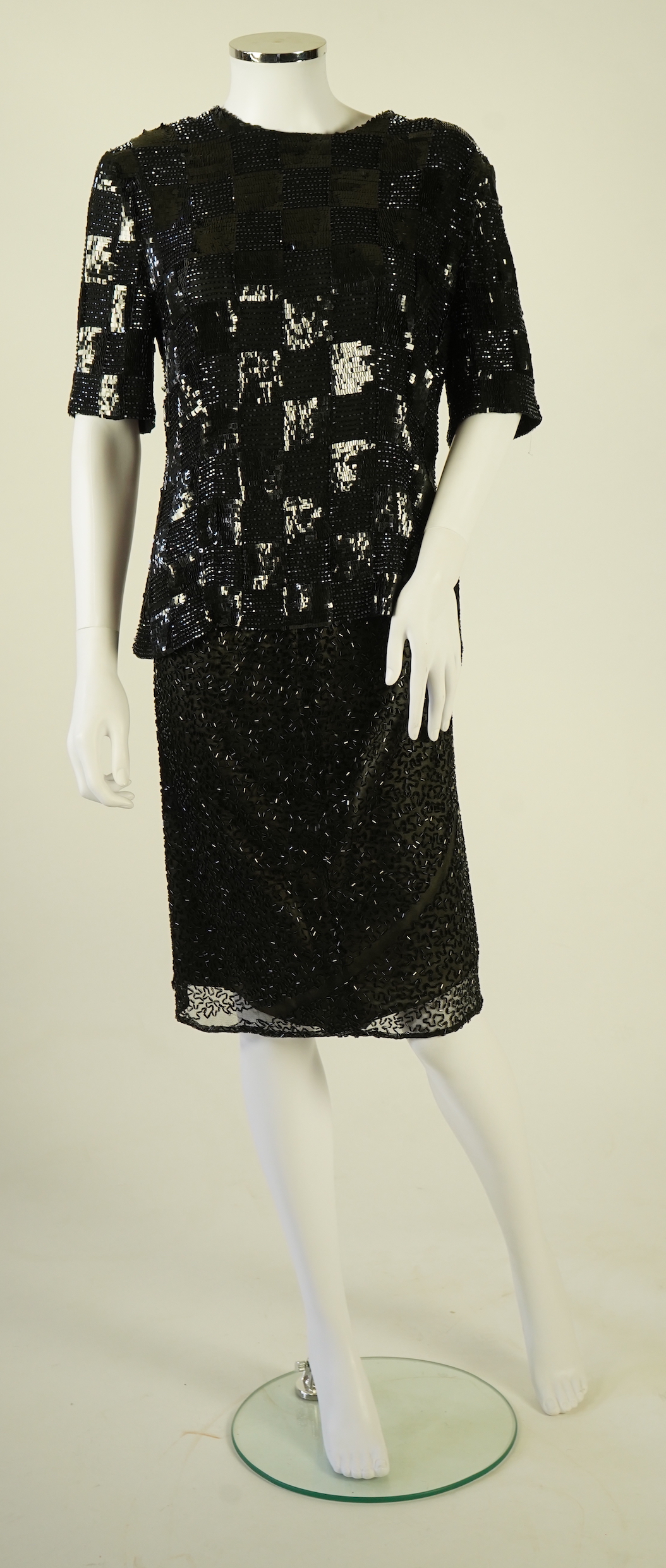 A lady's Jaeger black sequin skirt and black sequin top (not matching). Size UK 12-14